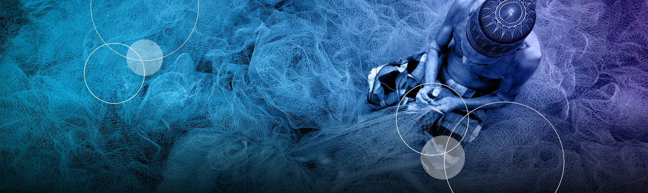 old man working on a fish nest